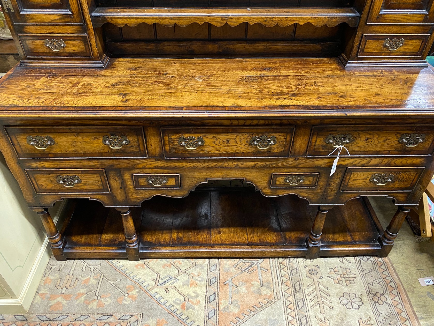 An 18th century style mahogany banded oak potboard dresser with boarded rack, width 167cm, depth 48cm, height 204cm